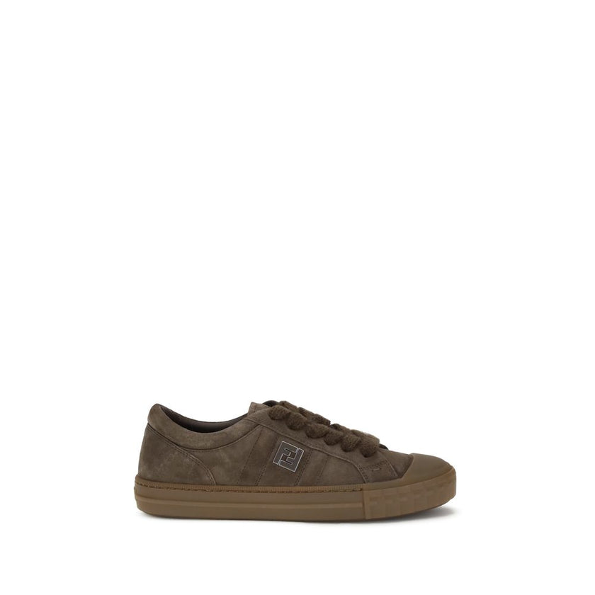 Brown Rubber Low Top SneakersDomino Sneakers by Fendi reinterpret urban style with refined details and high-quality materials. This low-top lace-up model is crafted in soft brown suede, with an elegant tone-on-tone metal FF side detail, enhanced by a ruth