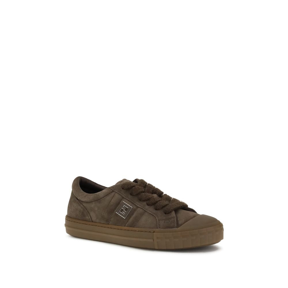 Brown Rubber Low Top SneakersDomino Sneakers by Fendi reinterpret urban style with refined details and high-quality materials. This low-top lace-up model is crafted in soft brown suede, with an elegant tone-on-tone metal FF side detail, enhanced by a ruth