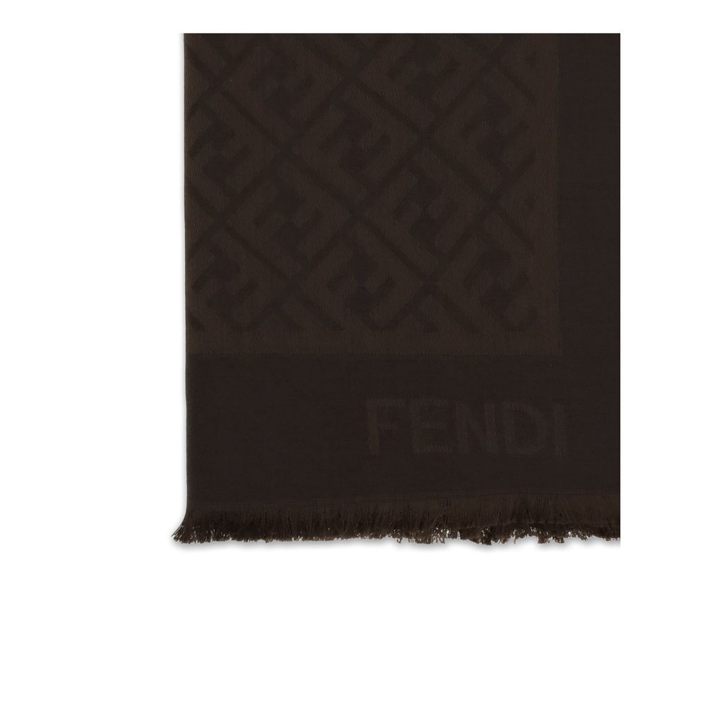 Silk FF ShawlFF Shawl by Fendi is a refined accessory made from a fine blend of organic silk and wool, offered in delicate ivory tones. The soft and enveloping texture is enhanced by the jacquard workmanship, which elegantly reproduces the iconic FF motif