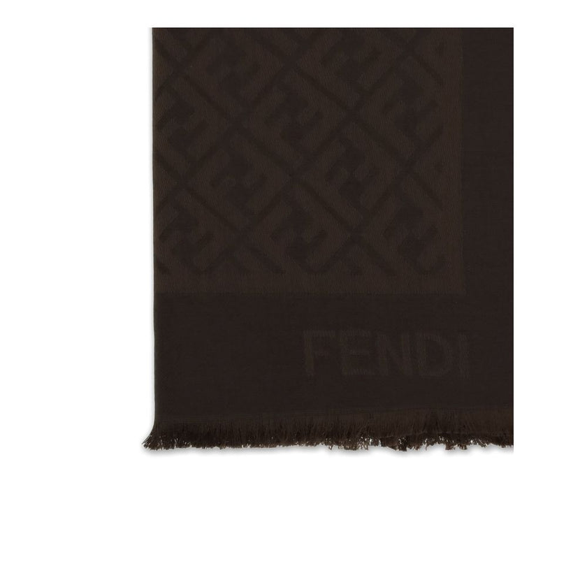 Silk FF ShawlFF Shawl by Fendi is a refined accessory made from a fine blend of organic silk and wool, offered in delicate ivory tones. The soft and enveloping texture is enhanced by the jacquard workmanship, which elegantly reproduces the iconic FF motif