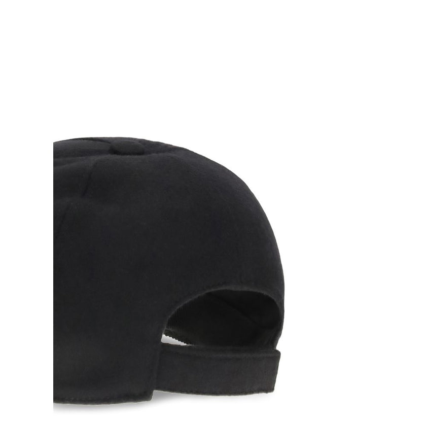 Black Wool Cap (Baseball Hat)Wool Baseball Hat by Fendi is a sophisticated accessory that combines sporty style and fine materials. Made entirely of wool felt and cashmere, it features a semi-rigid visor that maintains shape without sacrificing comfort. T