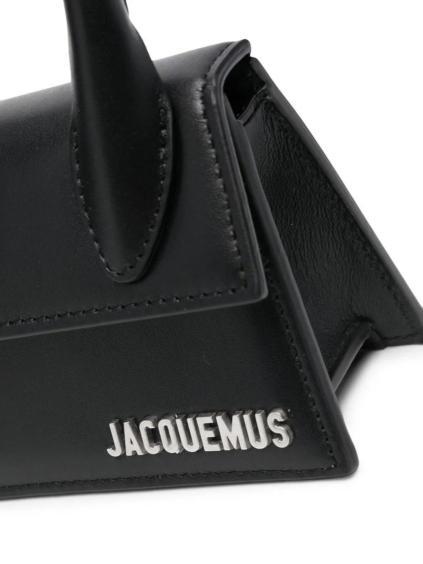 Black Le Chiquito Homme Crossbody BagJACQUEMUS Gorgeous brand new, 100% Authentic Jacquemus Le Chiquito Homme Crossbody Bag Model: 216BA001-3061-990 Color: Black with Silver Hardware – Reinforced handle – Magnetic flap closure – Removable long shoulder st