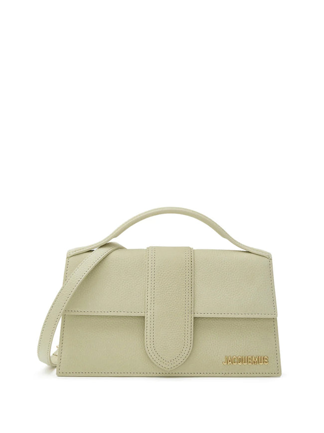 Beige Textured Le Grand Bambino BagJACQUEMUS Gorgeous brand new, 100% Authentic Jacquemus Le Grand Bambino Beige Bag. Model: 213BA007-3012-210 Color: Beige with Gold Hardware Material: Leather Beige with adjustable shoulder strap – Small handle – Removabl