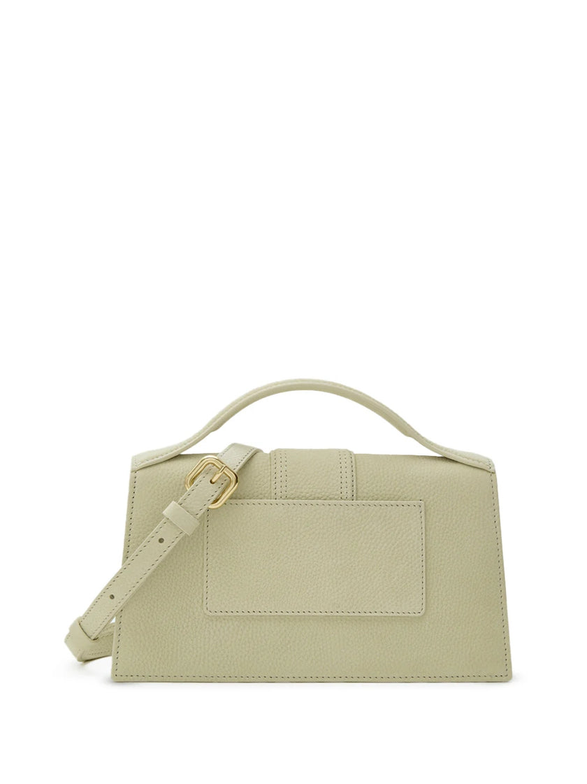 Beige Textured Le Grand Bambino BagJACQUEMUS Gorgeous brand new, 100% Authentic Jacquemus Le Grand Bambino Beige Bag. Model: 213BA007-3012-210 Color: Beige with Gold Hardware Material: Leather Beige with adjustable shoulder strap – Small handle – Removabl