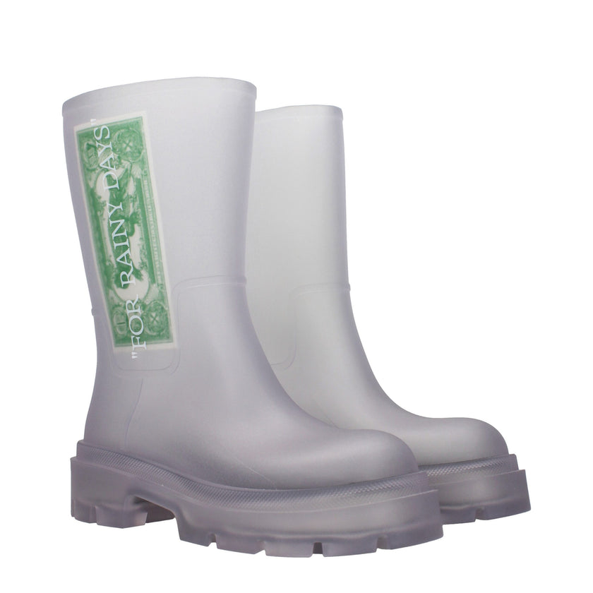 Transparent Pvc Ankle BootsDescription: The product with MPN OMIE00BMAT001DOLLAR7901 and code F84977 pvc in transparent is a ankle boots designed by Off-White. It has features like side logo, back logo.Transparent Pvc Ankle Boots${tagsOff-WhiteAulae Trans