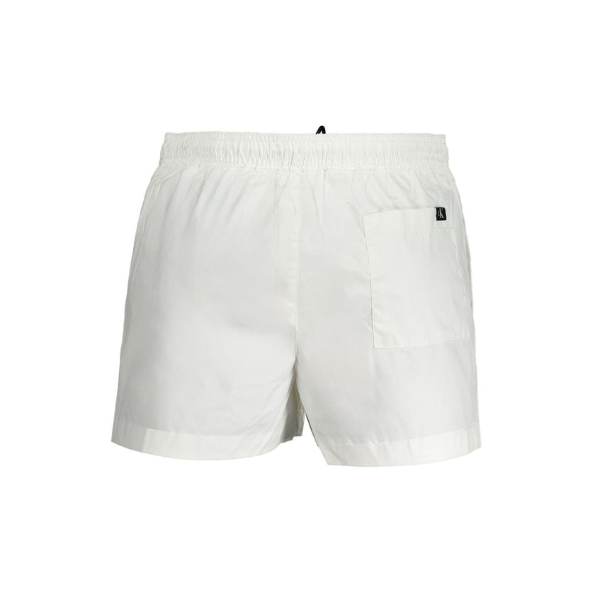 White Polyester SwimwearSHORT SWIMMING BOXER, INSIDE WITH SLIP, 2 POCKETS, 1 BACK POCKET, ELASTIC WAIST WITH LACES, PRINT, LOGO, 95% RECYCLED POLYESTERWhite Polyester Swimwear${tagsCalvin KleinAulae White Polyester Swimwear Calvin KleinAulae White Polyest