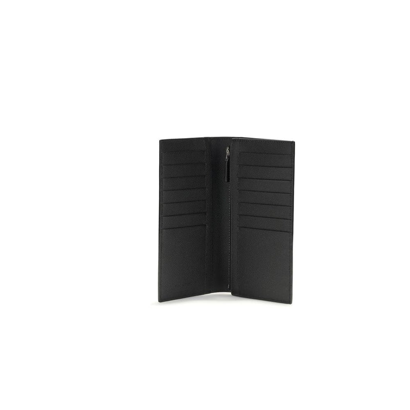 Black Calf Leather Bos Taurus WalletSaint Laurent’s grained leather Wallet combines functionality and sophistication in a compact, curated design. Featuring a printed logo laminated on the front, it features a gusseted compartment, three slit pockets, a c