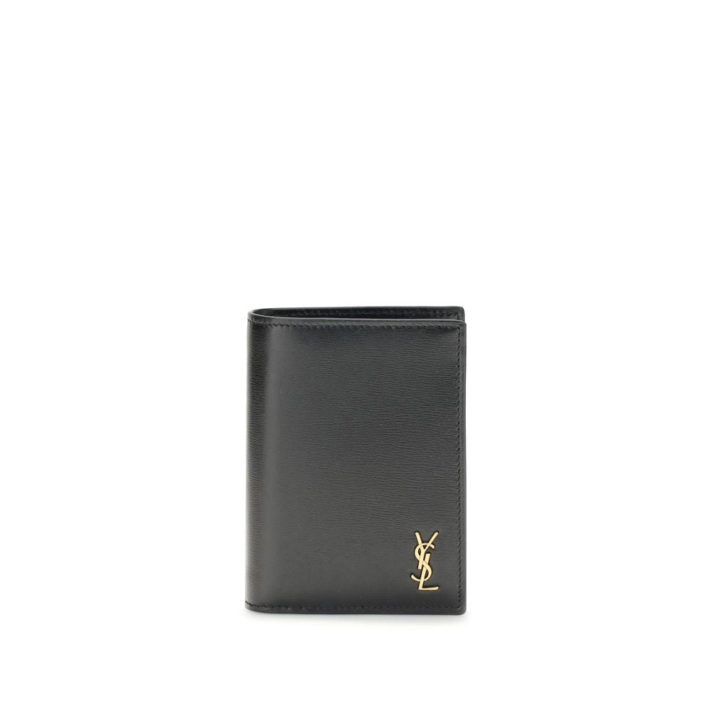 Black Calf Leather Bos Taurus WalletThe Tiny Cassandre credit Card Holder by Saint Laurent is a compact and sophisticated accessory designed for discreet elegance. Crafted with attention to detail, it is embellished with the YSL initials in pint-sized met