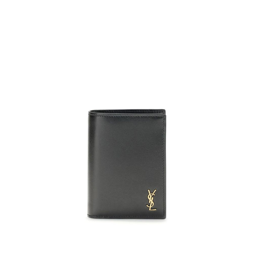 Black Calf Leather Bos Taurus WalletThe Tiny Cassandre credit Card Holder by Saint Laurent is a compact and sophisticated accessory designed for discreet elegance. Crafted with attention to detail, it is embellished with the YSL initials in pint-sized met