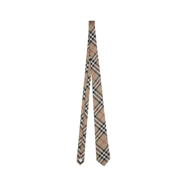 Manston TiesBurberry’s Manston Tie is a timeless accessory that celebrates the brand’s visual identity. Crafted with painstaking care, it is embellished with the iconic Archivio Check print, a distinctive symbol of Burberry style. Elegant and recognizable