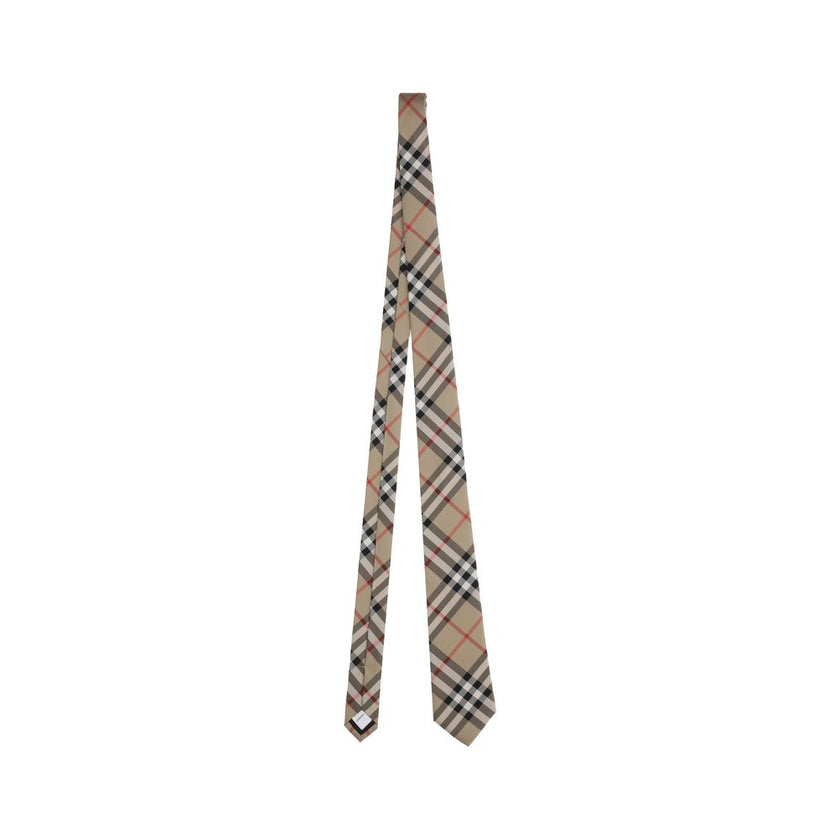 Manston TiesBurberry’s Manston Tie is a timeless accessory that celebrates the brand’s visual identity. Crafted with painstaking care, it is embellished with the iconic Archivio Check print, a distinctive symbol of Burberry style. Elegant and recognizable