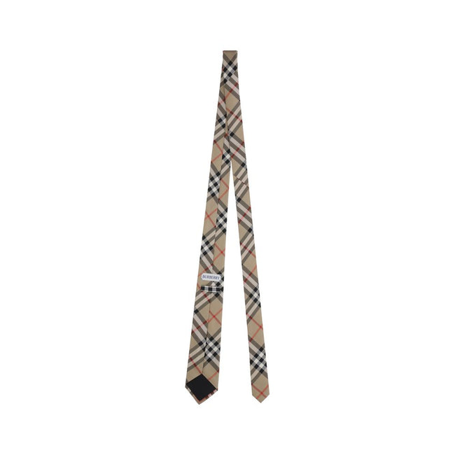 Manston TiesBurberry’s Manston Tie is a timeless accessory that celebrates the brand’s visual identity. Crafted with painstaking care, it is embellished with the iconic Archivio Check print, a distinctive symbol of Burberry style. Elegant and recognizable