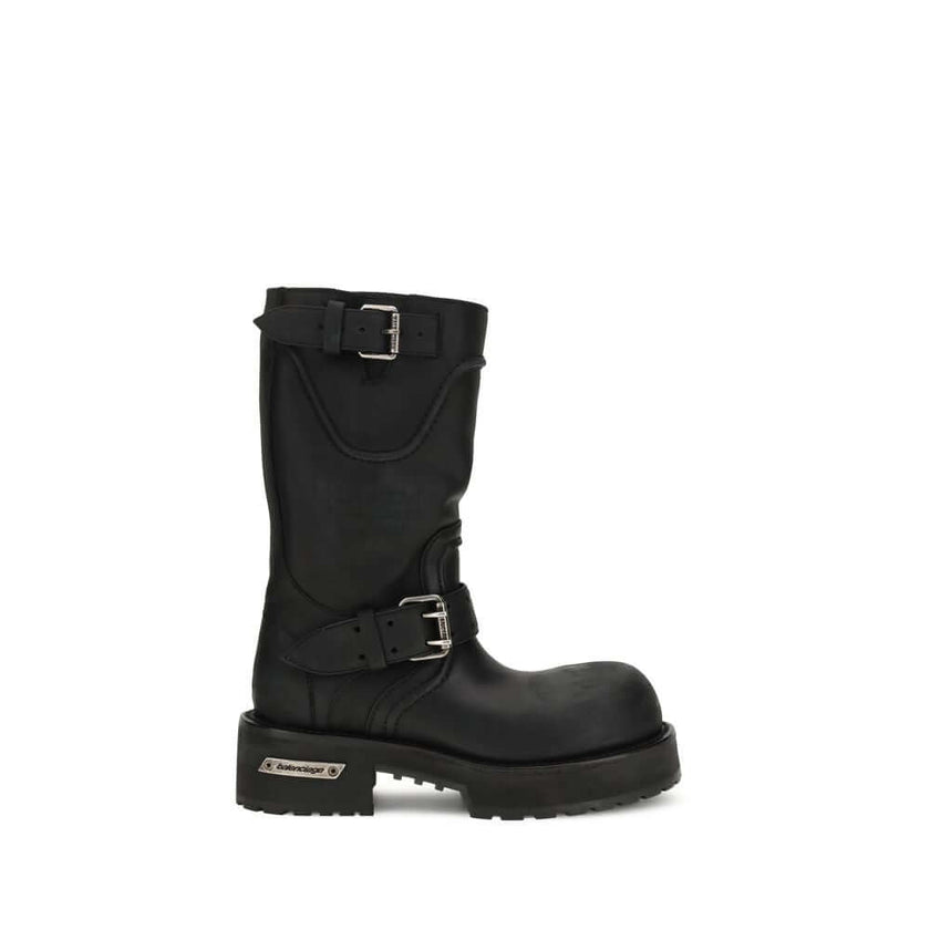 Black Calf Leather Bos Taurus Lace-Up BootsVenom Boots by Balenciaga are a bold and contemporary interpretation of urban style. Featuring an ultra-round toe and a 20 mm curvature, they stand out for their worn-in effect that gives a worn-in, gritty look.