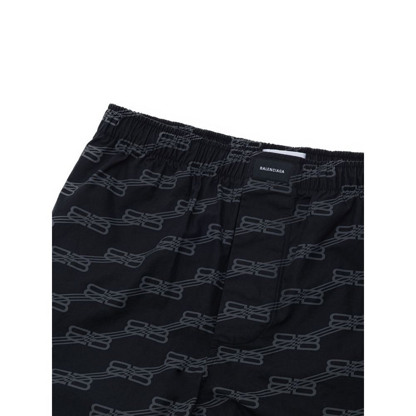 Black Cotton Bermuda ShortsBalenciaga Allover Logo Shorts. Pyjama shorts model, elastic waist, front button closure, two side welt pockets Composition: 100% Cotton Internal SKU: 25MG103 Brand SKU: 671664TML361269Black Cotton Bermuda Shorts${tagsBalenciaga