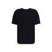 Black Cotton T-ShirtThe Balmain T-shirt is a bold piece that combines comfort with contemporary style. Crafted from soft cotton, it features an oversized fit, a round neckline, and short sleeves. The leopard print, enhanced by the brand’s iconic lettering