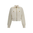White Viscose BomberThe Tweed Bomber Jacket by Balmain reimagines a sporty classic with the Maison’s unmistakable elegance. Featuring a high collar and batwing long sleeves, it offers volume and modernity, while the decorative side pockets are detailed wi