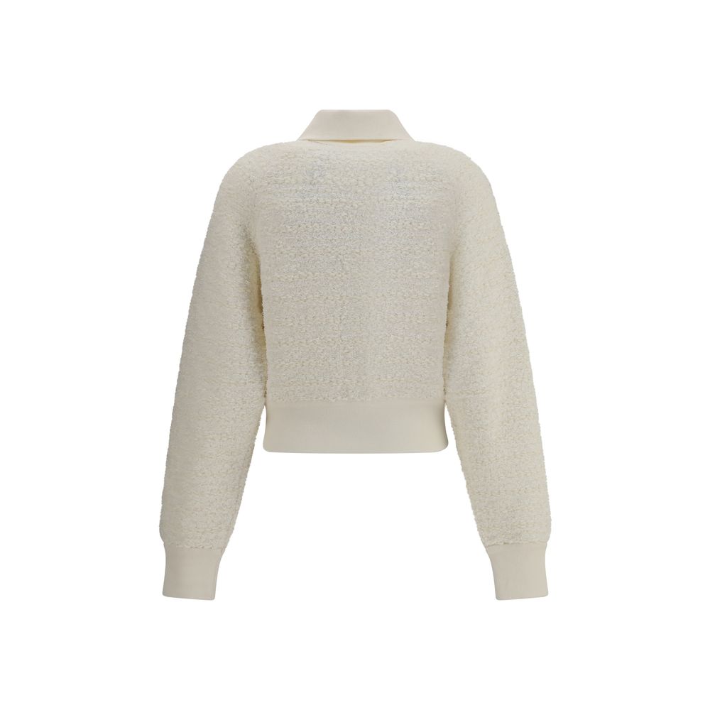 White Viscose BomberThe Tweed Bomber Jacket by Balmain reimagines a sporty classic with the Maison’s unmistakable elegance. Featuring a high collar and batwing long sleeves, it offers volume and modernity, while the decorative side pockets are detailed wi