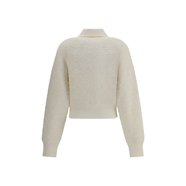 White Viscose BomberThe Tweed Bomber Jacket by Balmain reimagines a sporty classic with the Maison’s unmistakable elegance. Featuring a high collar and batwing long sleeves, it offers volume and modernity, while the decorative side pockets are detailed wi