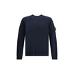 Virgin Wool SweaterThe Stone Island Sweater is crafted from 100% virgin wool and defined by its clean design and the brand’s iconic details. It features a round neck, long sleeves, a logo patch on the sleeve, and ribbed cuffs and hem for comfort and a per