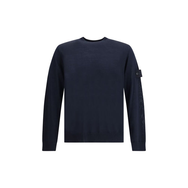 Virgin Wool SweaterThe Stone Island Sweater is crafted from 100% virgin wool and defined by its clean design and the brand’s iconic details. It features a round neck, long sleeves, a logo patch on the sleeve, and ribbed cuffs and hem for comfort and a per