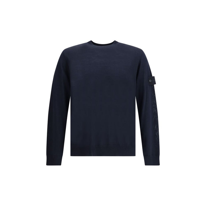 Virgin Wool SweaterThe Stone Island Sweater is crafted from 100% virgin wool and defined by its clean design and the brand’s iconic details. It features a round neck, long sleeves, a logo patch on the sleeve, and ribbed cuffs and hem for comfort and a per