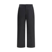 Black Cotton Casual PantsCotton Pants by Gucci with front zipper and button closure. They feature two side slash pockets, two welt pockets on the back, one with a flap, and belt loops at the waist. The monochrome pattern gives a clean and elegant look, pe