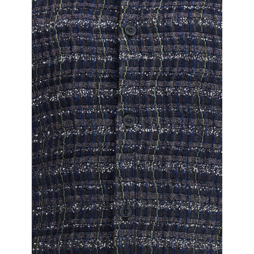 Blue Viscose CoatJacket by Missoni features an exclusive check wave pattern that creates a dynamic and sophisticated visual effect. The viscose blend fabric enriched with lamé filaments gives bright highlights and a sophisticated touch. The design combine