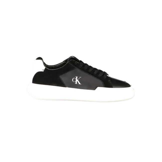 Black Leather Men SneakerEmbark on a sartorial journey with the audacious spirit of Calvin Klein. These sneakers aren’t just footwear; they are a statement of contrast and sophistication. Designed to captivate with their bold black base and striking white