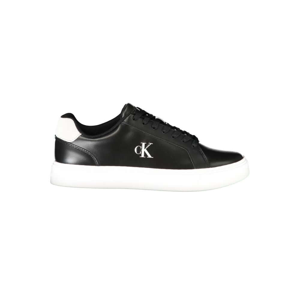 Black Leather Men SneakerUnleash your stride with the cutting-edge Calvin Klein sports sneakers. A fusion of sophistication and athletic flair, these shoes feature striking contrasting white details and a prominent Calvin Klein logo that captures attentio