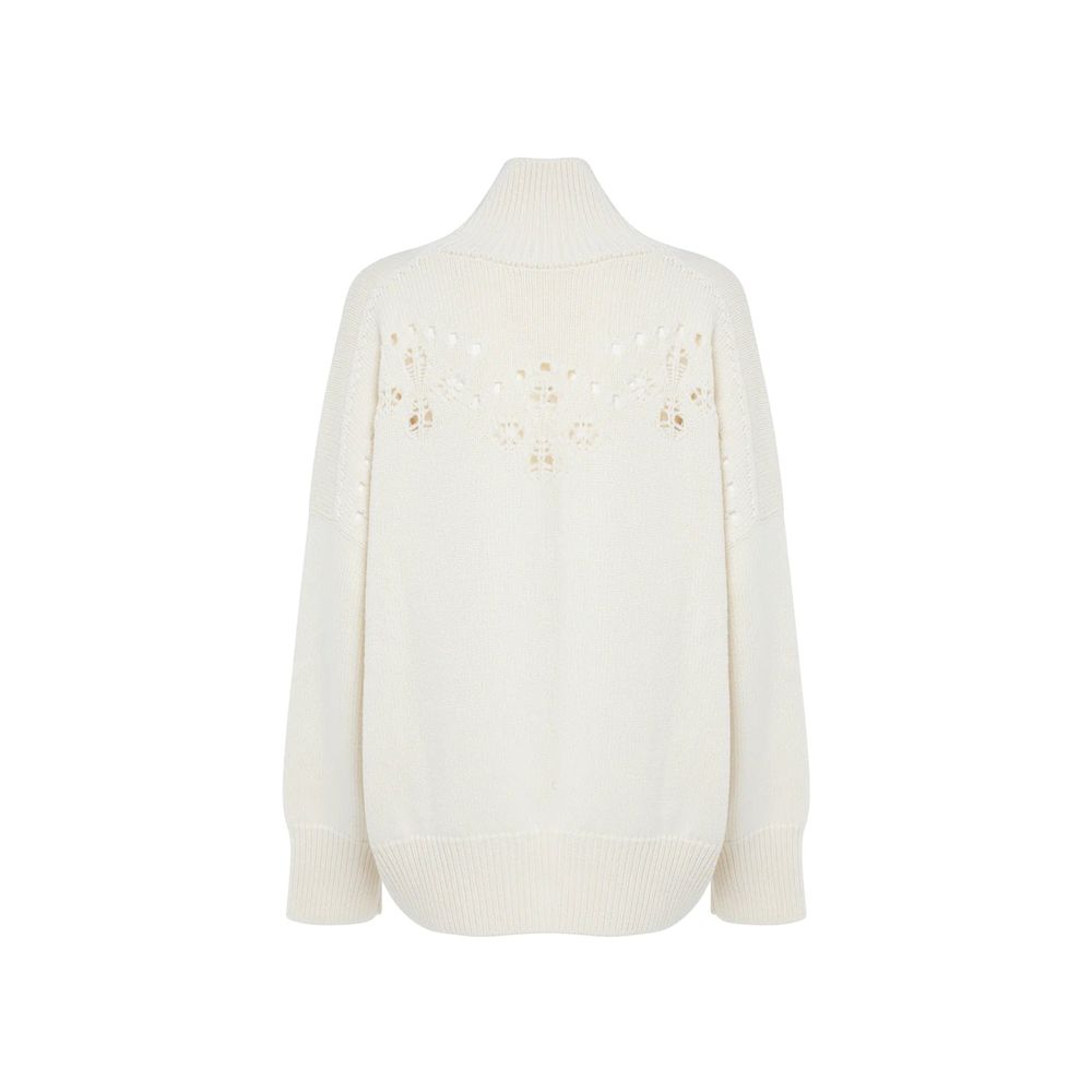 White Wool SweaterDescription: – Composition: 100% Wool – Long sleeves – Ribbed trims – Hand wash – High neck – Pointelle knit – Perforated detailing – Drop shoulder – Bishop sleeves – Made in Italy – Gender: WOMEN –White Wool Sweater${tagsChloéAulae Whit