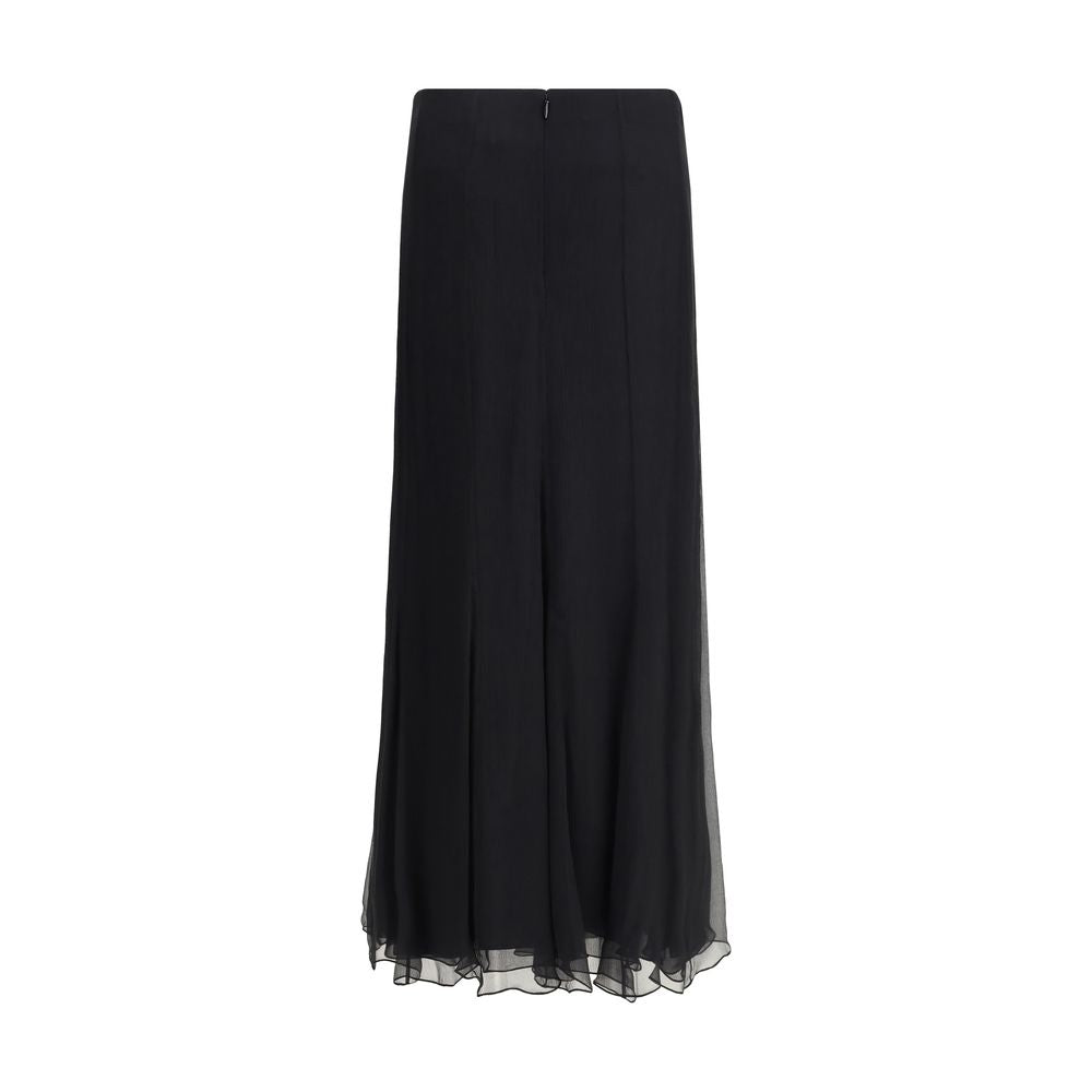 Black Silk Long SkirtThe Silk Long Skirt by Chloé embodies femininity with lightness and refinement. The fluid fit flows naturally with movement, while the back zip closure preserves the clean silhouette. An essential and sophisticated piece, perfect for