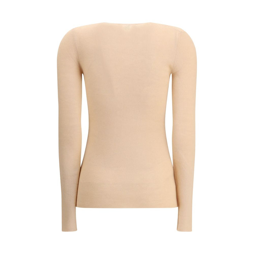 Multicolor Merino Wool SweatshirtThe Merino Wool Henley Sweater by Chloé brings everyday elegance to life with refined details. Rib-knit construction frames the V-neckline with fabric-covered buttons, complemented by long sleeves and a straight hem that e