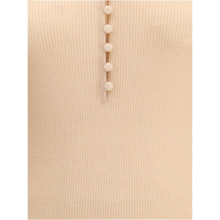 Multicolor Merino Wool SweatshirtThe Merino Wool Henley Sweater by Chloé brings everyday elegance to life with refined details. Rib-knit construction frames the V-neckline with fabric-covered buttons, complemented by long sleeves and a straight hem that e