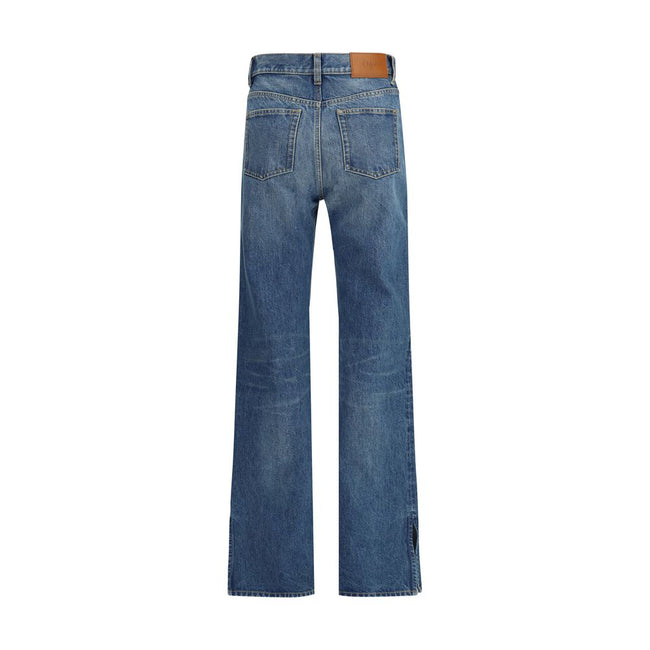 Blue Cotton Straight-Leg JeansThe Organic Cotton Straight-Leg Denim Jeans by Chloé combine tradition and modernity with a refined indigo wash and a slit hem that adds movement to the silhouette. The front zip and Chloé-engraved button fastening enrich the