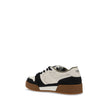Black Calf Leather Bos Taurus Low Top SneakersCalfskin Match Low Sneakers by Fendi featuring lace-up front closure, paneled design with suede inserts, iconic brand FF logo on embossed side panels, perforated round toe, iconic brand signature patch embroid