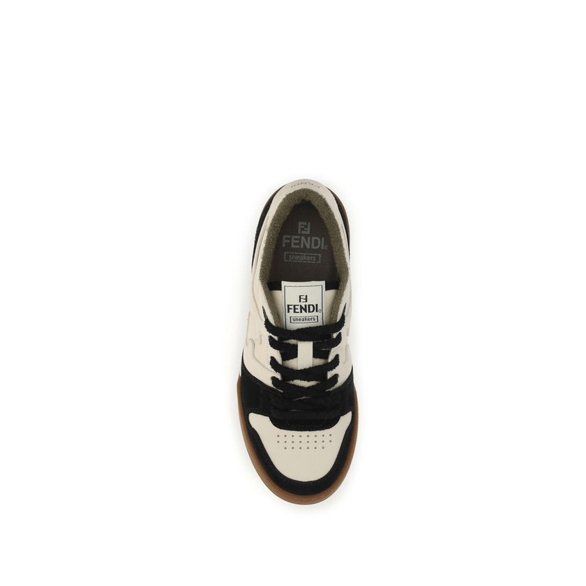 Black Calf Leather Bos Taurus Low Top SneakersCalfskin Match Low Sneakers by Fendi featuring lace-up front closure, paneled design with suede inserts, iconic brand FF logo on embossed side panels, perforated round toe, iconic brand signature patch embroid