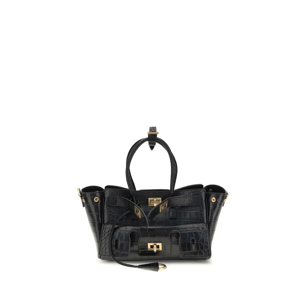 Bel Air mini Shoulder BagBalenciaga’s Bel Air mini Shoulder Bag is made of calfskin leather with crocodile processing, combining sophistication and iconic design. The carry-all model features two handles joined by a clip and an adjustable, removable shoul