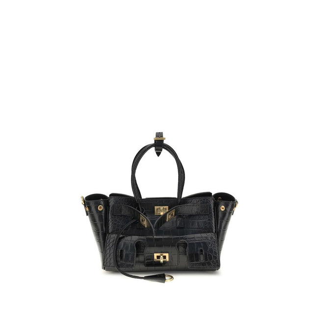 Bel Air mini Shoulder BagBalenciaga’s Bel Air mini Shoulder Bag is made of calfskin leather with crocodile processing, combining sophistication and iconic design. The carry-all model features two handles joined by a clip and an adjustable, removable shoul