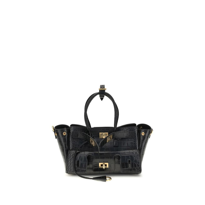 Bel Air mini Shoulder BagBalenciaga’s Bel Air mini Shoulder Bag is made of calfskin leather with crocodile processing, combining sophistication and iconic design. The carry-all model features two handles joined by a clip and an adjustable, removable shoul