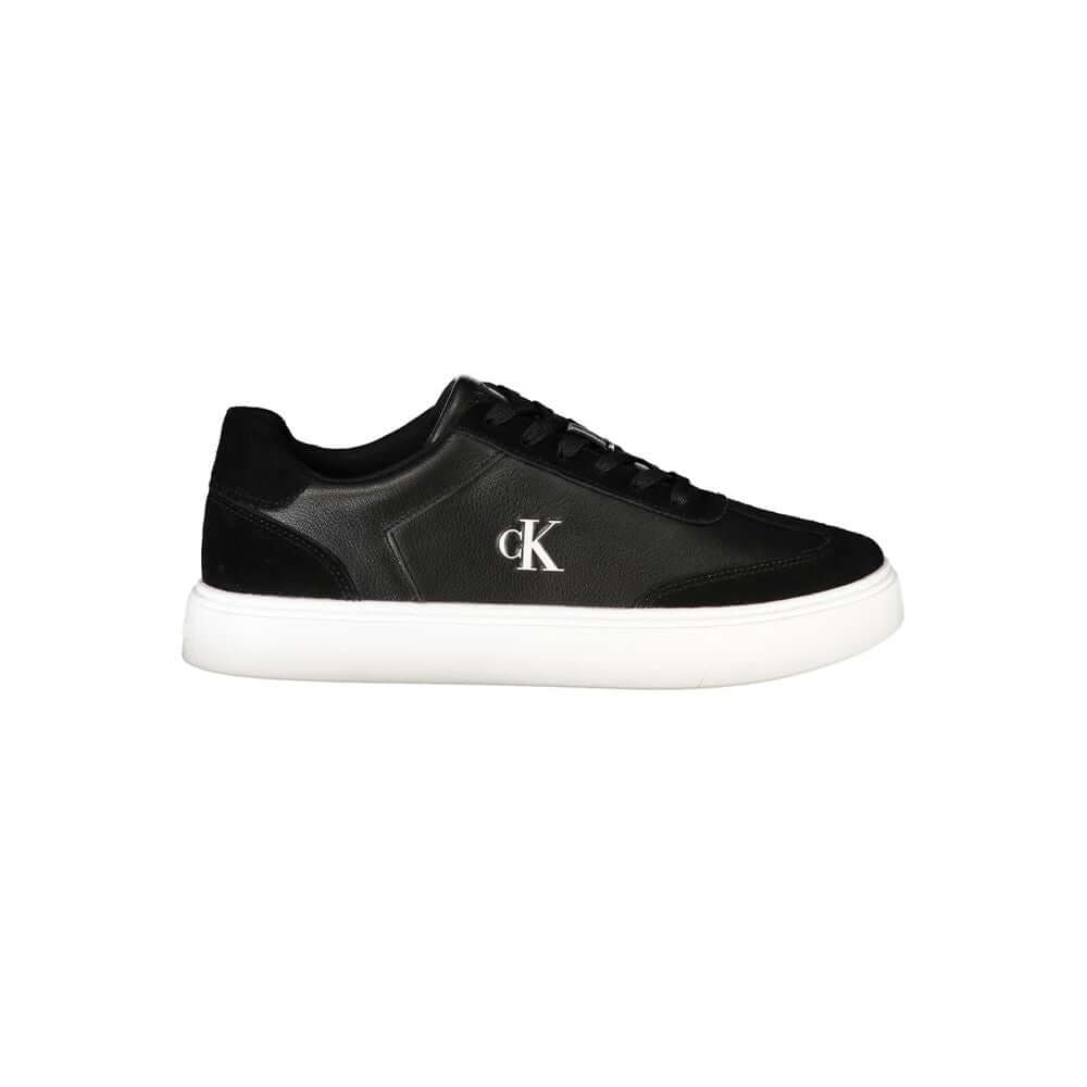 Black Leather Men SneakerIndulge in the sleek sophistication of Calvin Klein with these athletic sneakers that exude style in every step. Designed for the fashion-forward individual, these kicks boast contrasting black accents and a bold CK logo that assu