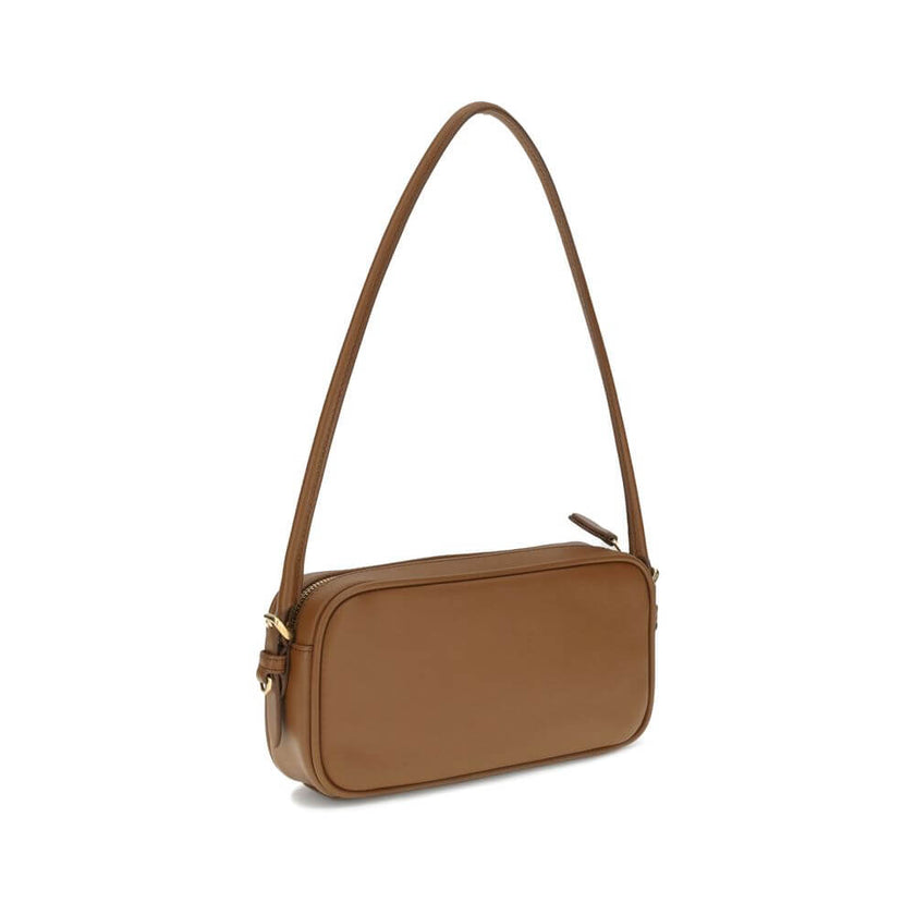 Brown Calf Leather Bos Taurus Shoulder BagShoulder Bag by Miu Miu is an elegant, minimalist accessory made of soft leather and embellished with tonal logo applique on the front, adding a discreet yet distinctive touch. Equipped with a round leather handle