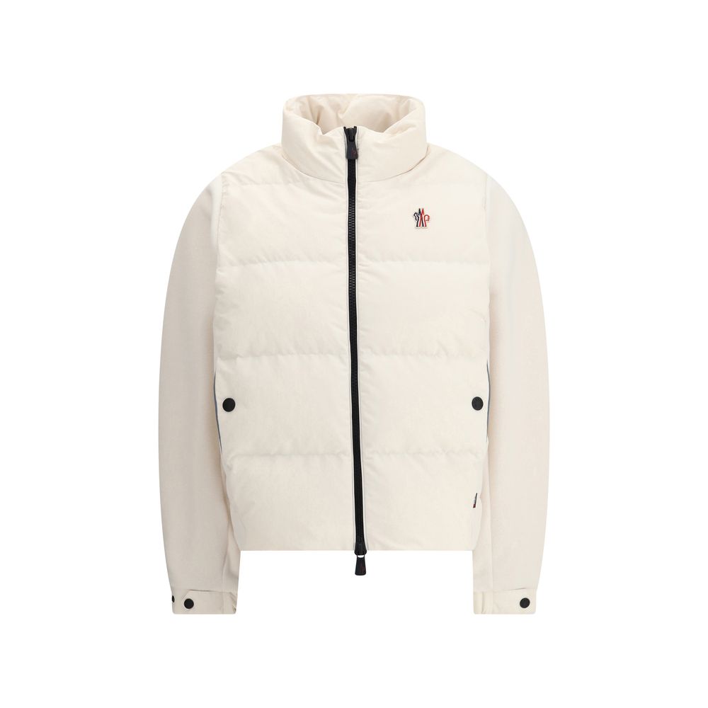 Jacket with sleeves in contrastZip Jacket by Moncler Grenoble combines lightness and performance thanks to down-filled longue saison nylon, which provides warmth without weighing down. The raised collar and black zipper emphasize a sporty, essential desig