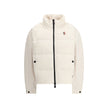 Jacket with sleeves in contrastZip Jacket by Moncler Grenoble combines lightness and performance thanks to down-filled longue saison nylon, which provides warmth without weighing down. The raised collar and black zipper emphasize a sporty, essential desig