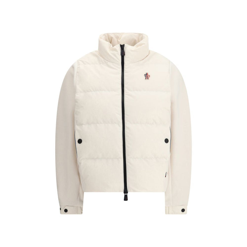 Jacket with sleeves in contrastZip Jacket by Moncler Grenoble combines lightness and performance thanks to down-filled longue saison nylon, which provides warmth without weighing down. The raised collar and black zipper emphasize a sporty, essential desig
