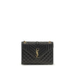 Black Calf Leather Bos Taurus Shoulder BagEnvelope medium Shoulder Bag by Saint Laurent is a timeless icon defined by elegant quilted chevron stitching, checks and vertical lines. The leather shoulder strap with sliding chain allows it to be worn on the s