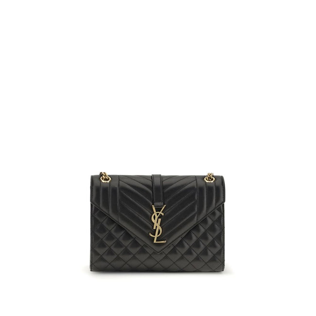 Black Calf Leather Bos Taurus Shoulder BagEnvelope medium Shoulder Bag by Saint Laurent is a timeless icon defined by elegant quilted chevron stitching, checks and vertical lines. The leather shoulder strap with sliding chain allows it to be worn on the s