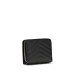 Black Calf Leather Bos Taurus WalletCassandre matelassé Wallet by Saint Laurent is a compact and sophisticated model, featuring the iconic intertwined YSL initials in gold-tone metal at the center and quilted stitching that enhances its elegance. The inte