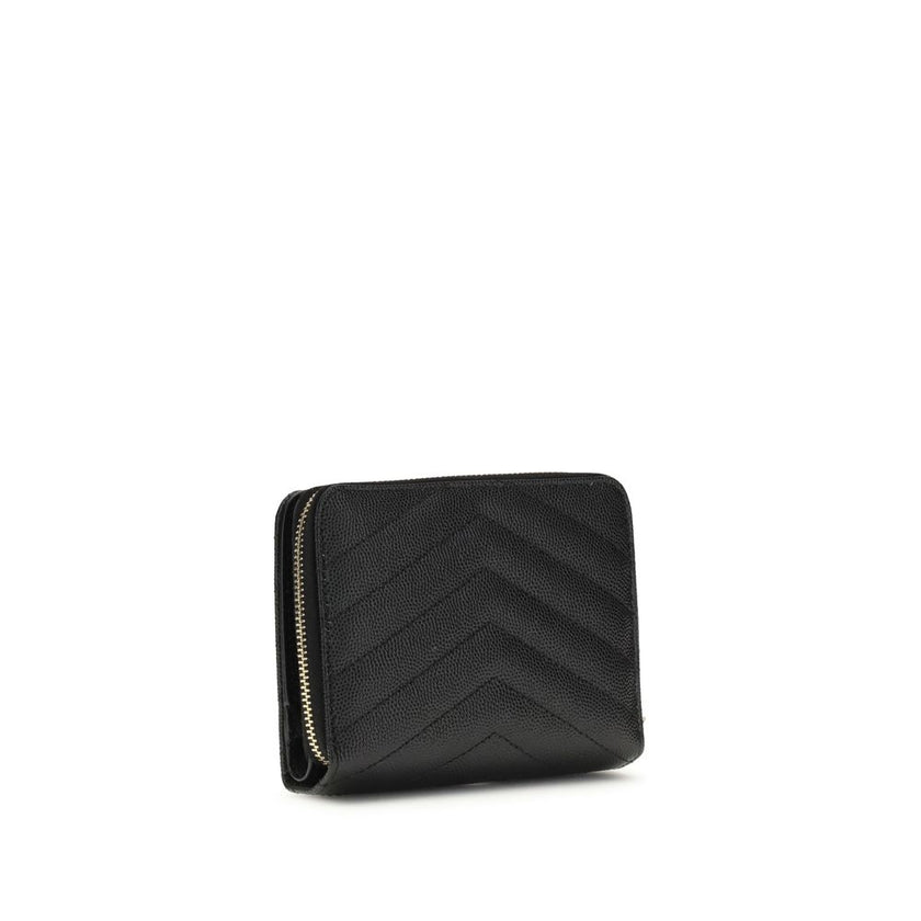 Black Calf Leather Bos Taurus WalletCassandre matelassé Wallet by Saint Laurent is a compact and sophisticated model, featuring the iconic intertwined YSL initials in gold-tone metal at the center and quilted stitching that enhances its elegance. The inte