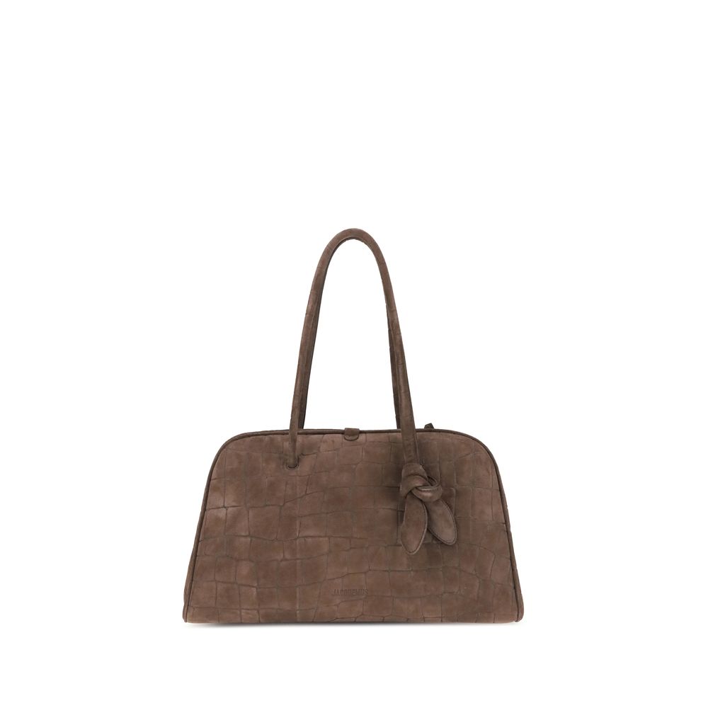 Il Turismo Shoulder BagThe Il Turismo Shoulder Bag by Jacquemus reinterprets the classic bowling bag with a contemporary twist. Crafted from crocodile-embossed suede, it features a two-way zip closure and matching tubular leather handles with a knotted de