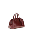 Bordeaux Calf Leather Bos Taurus HandbagThe Turismo Handbag by Jacquemus is crafted from polished leather with a sophisticated finish. The compact design is completed by a two-way zip closure, an internal zip pocket for easy organization, and an elegant b